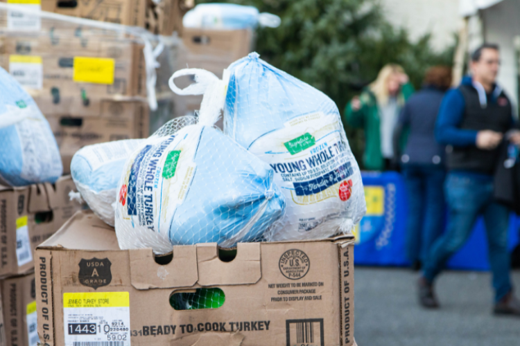 This past November, over 100 volunteers and staff came together to assemble 600 boxes of food as part of an annual Project HOME Thanksgiving tradition.  