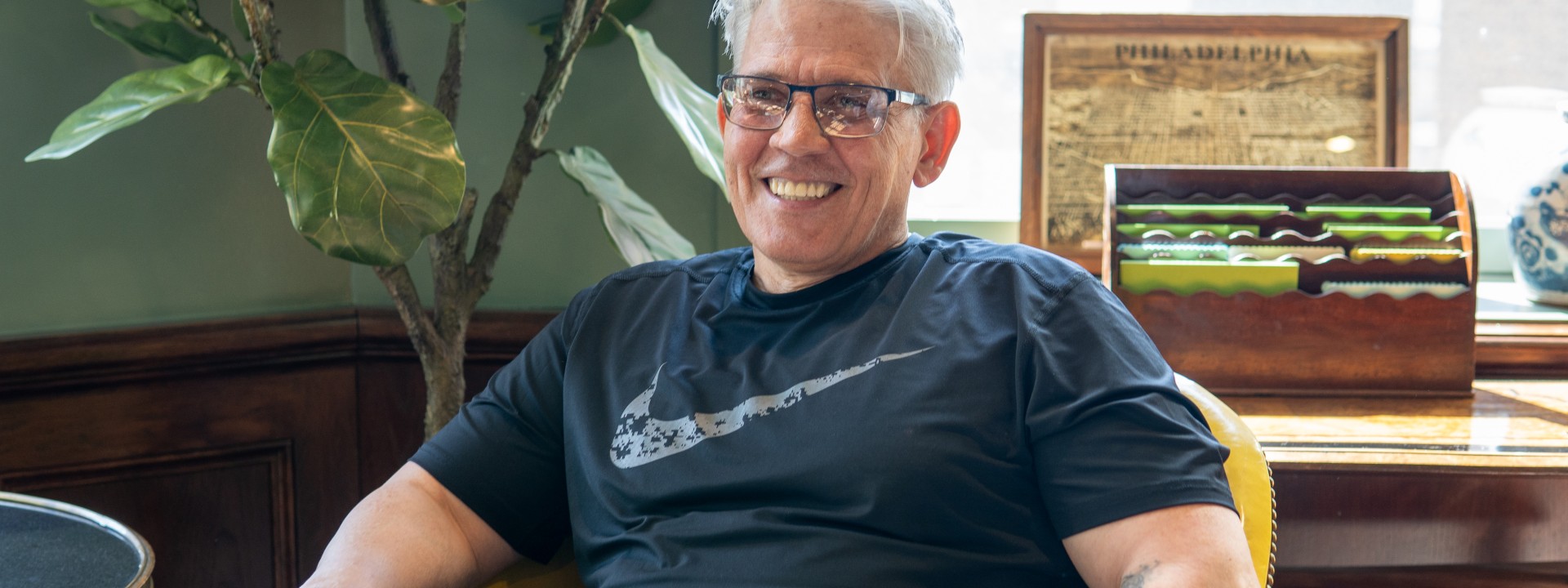 Image of resident sitting in chair