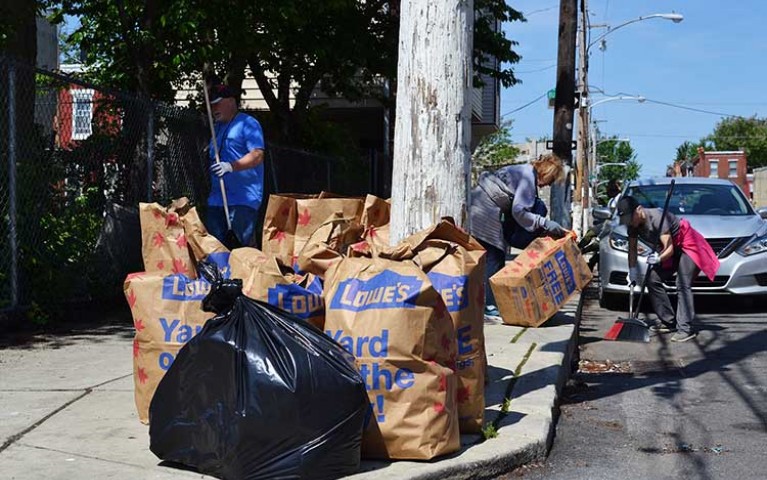 Project HOME volunteers cleaning up a Philadelphia neighborhood