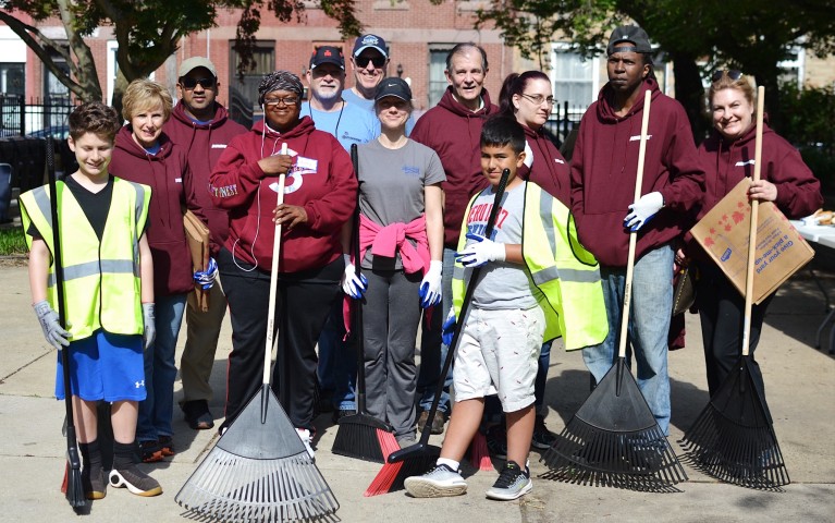 Volunteers standing for a group photo