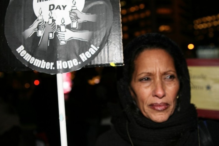 An attendee at a Homeless Memorial Day