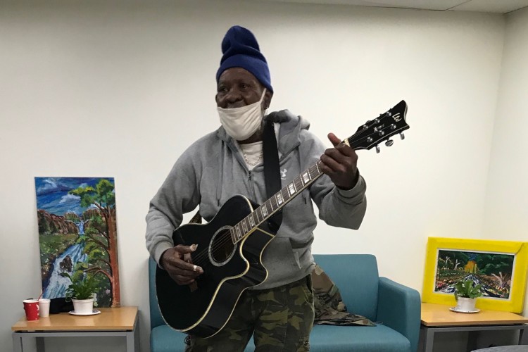 Mr. John regularly plays his guitar, Lucille, for members of the Living Room at the Hub of Hope in Suburban Station. 